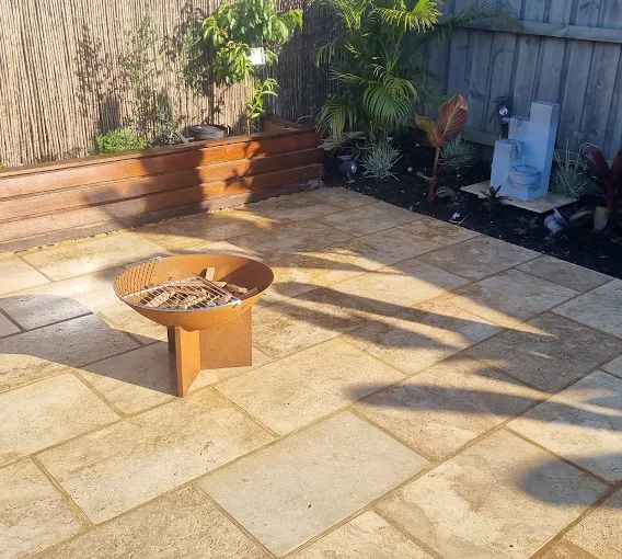 Freshly poured concrete path and driveway extension